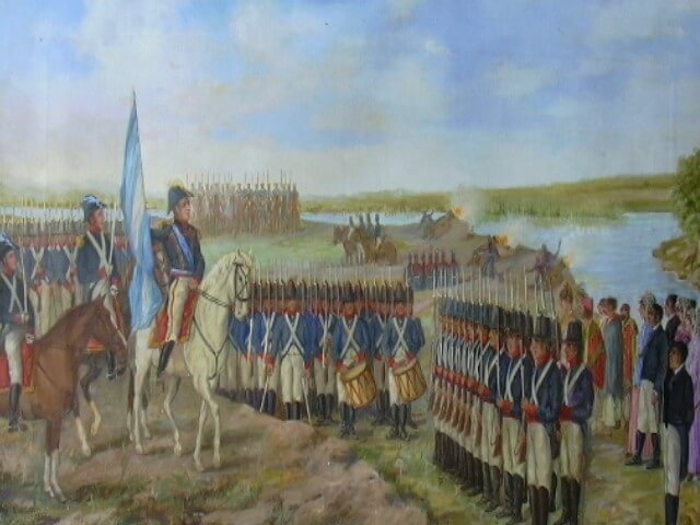 Manuel Belgrano enarbolando por primera vez la Bandera Azul y Blanca.